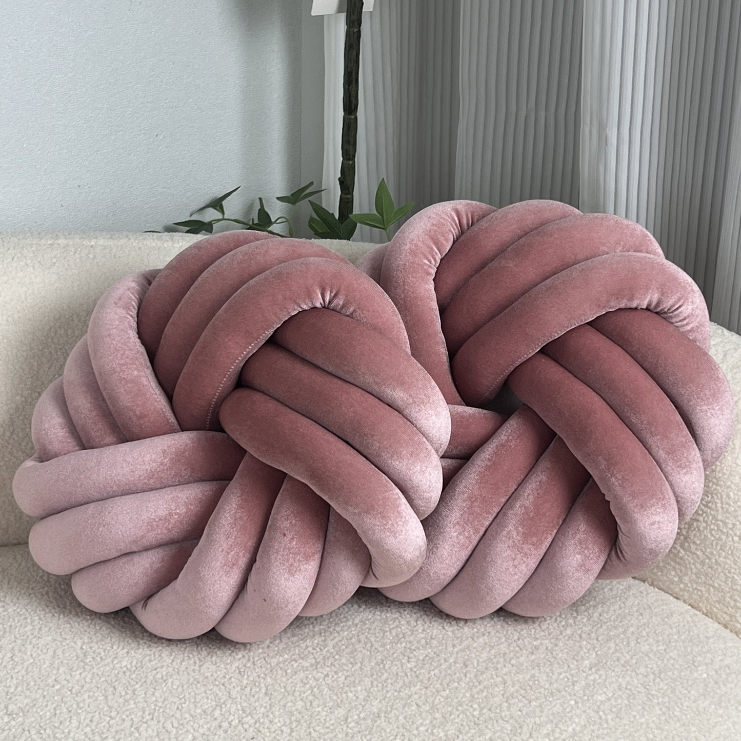 Two Piece Set Round Velvet Knot Cushion in soft pink color for stylish home decor