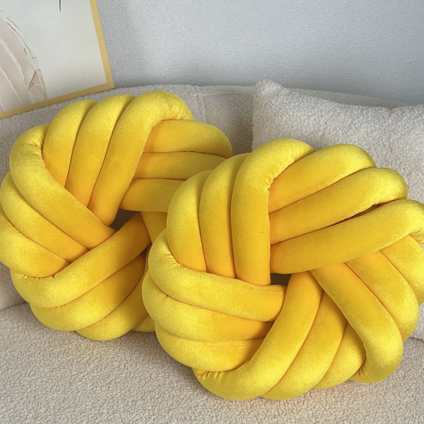 Two Piece Set Round Velvet Knot Cushion in bright yellow, ideal for modern home decor and comfort.