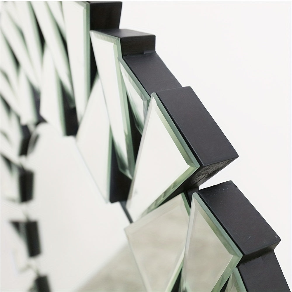 Close-up of Nutshell silver beveled decorative mirror with geometric design and black frame