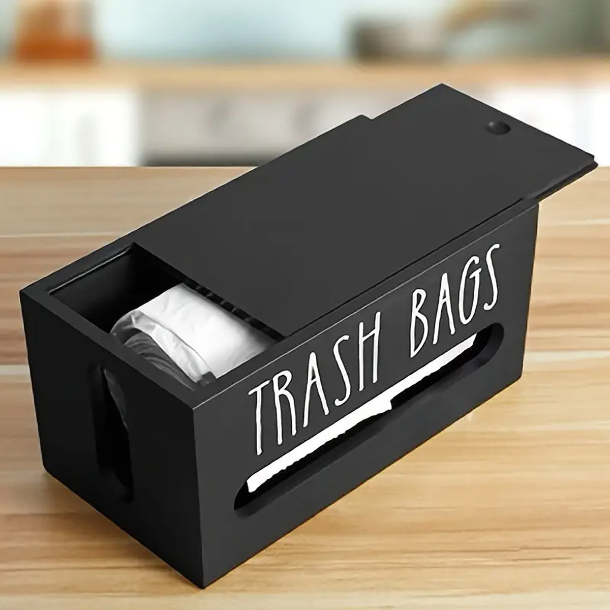 Nutshell wall-mounted trash bag dispenser for convenient kitchen organization