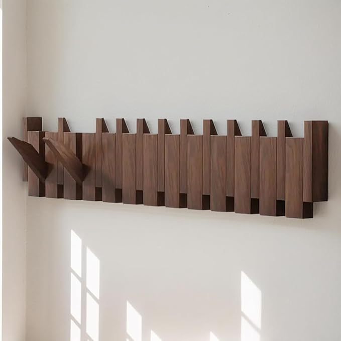 Nutshell wall mounted wooden coat hook with a sleek design for stylish home organization