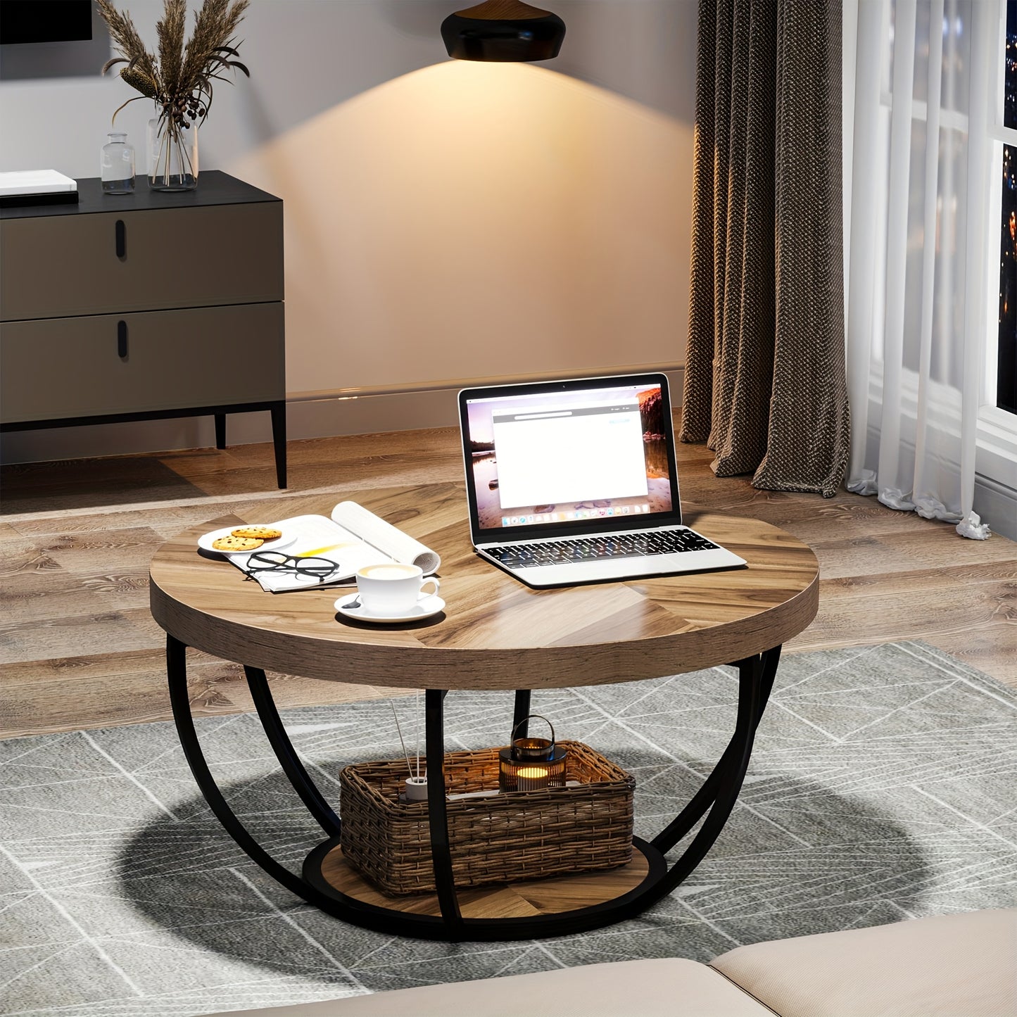 Nutshell wooden circular coffee table with black metal legs in a modern living room setting