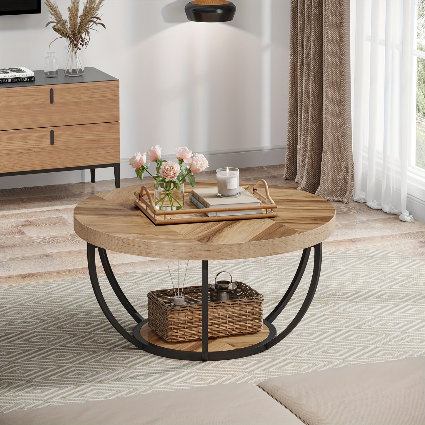 Nutshell wooden circular coffee table with black metal base in modern living room setting