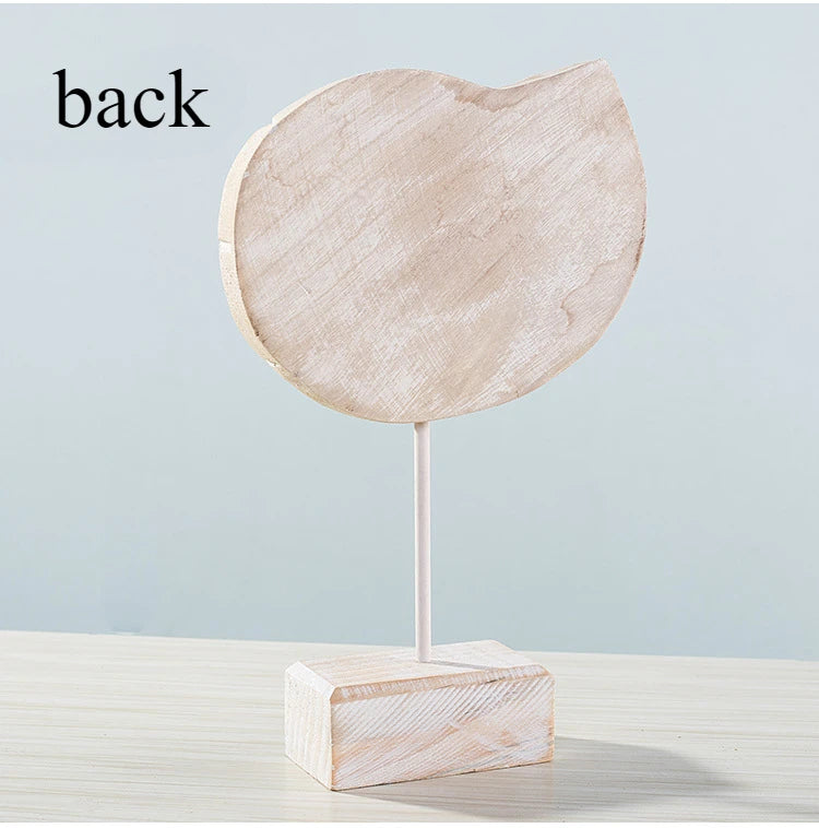 Back view of Nutshell wooden ocean theme decorations ornament on a stand