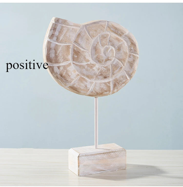 Nutshell wooden ocean theme decorations with a carved spiral shell design on a stand