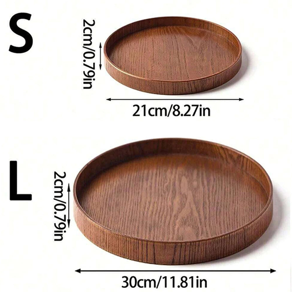 Small and large wooden serving tray by Nutshell with round shape and natural wood finish