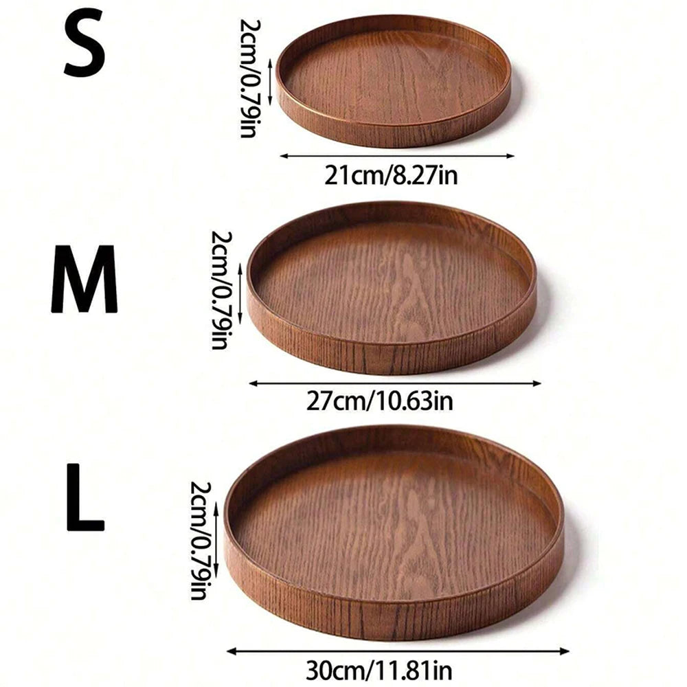 Nutshell wooden serving tray set in small medium and large sizes with round shape and raised edges