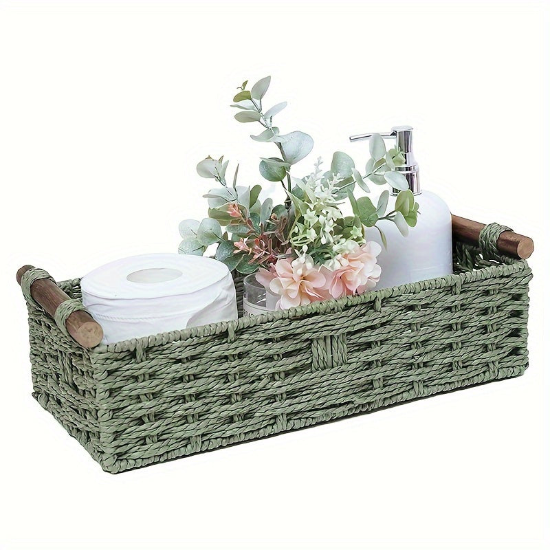 Nutshell woven storage basket in green with wooden handles, ideal for organizing bathroom essentials