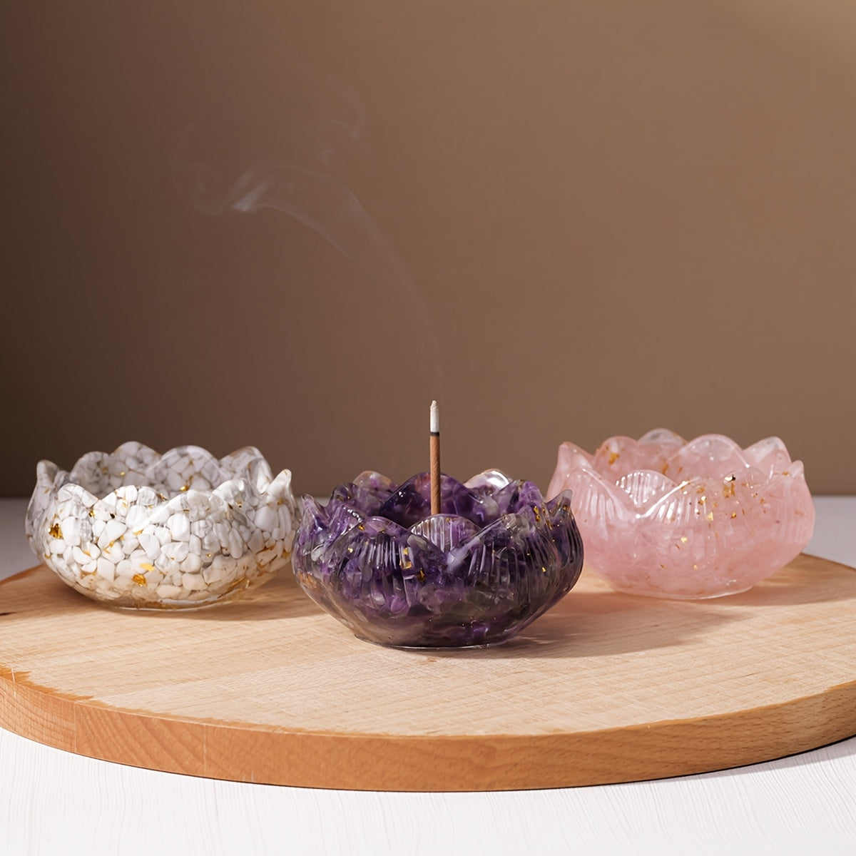 Zen lotus incense burner set featuring three decorative holders in white, purple, and pink