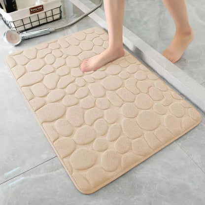 Nutshell 3D non slip bathroom mat in beige with a textured pebble design for safety and comfort