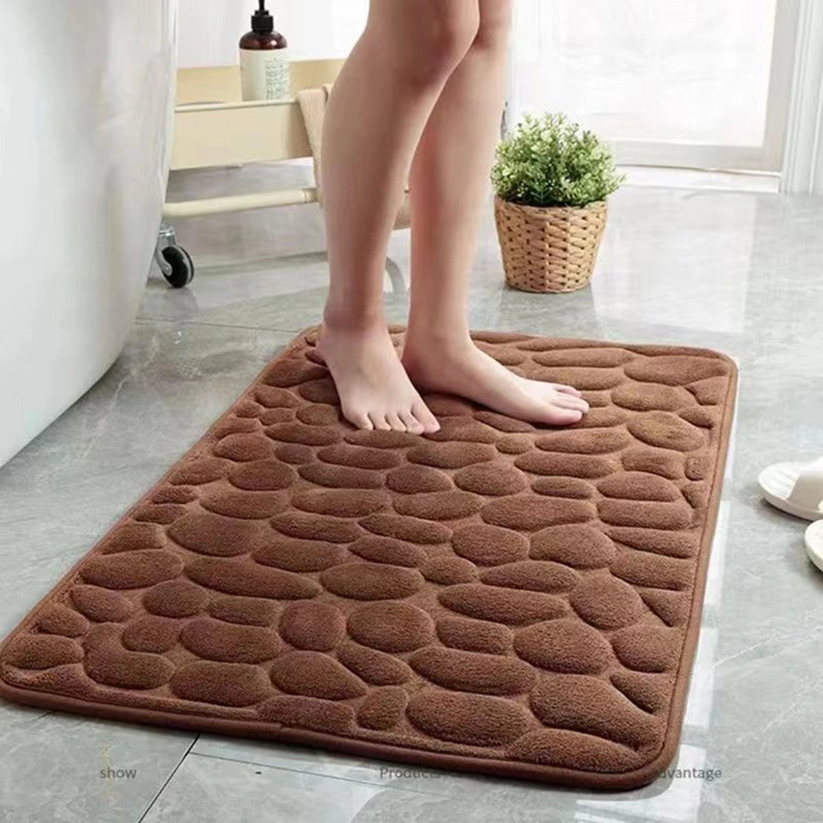 3D non slip bathroom mat in brown with soft texture, providing comfort and safety for wet feet