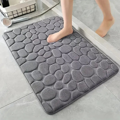 Nutshell 3D non slip bathroom mat in gray with pebble texture for comfort and safety