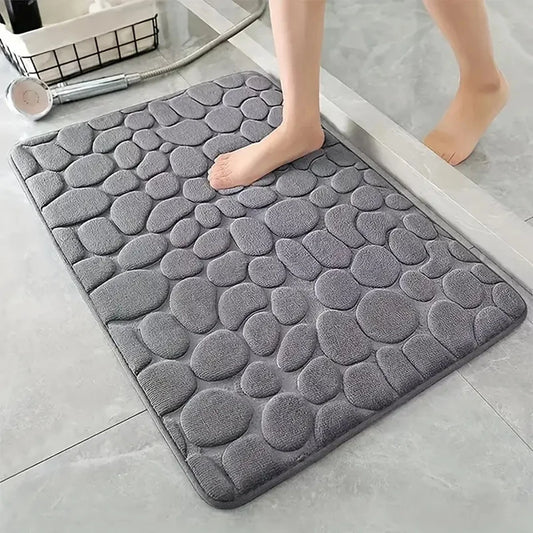 Nutshell 3D non slip bathroom mat in gray with pebble texture for comfort and safety