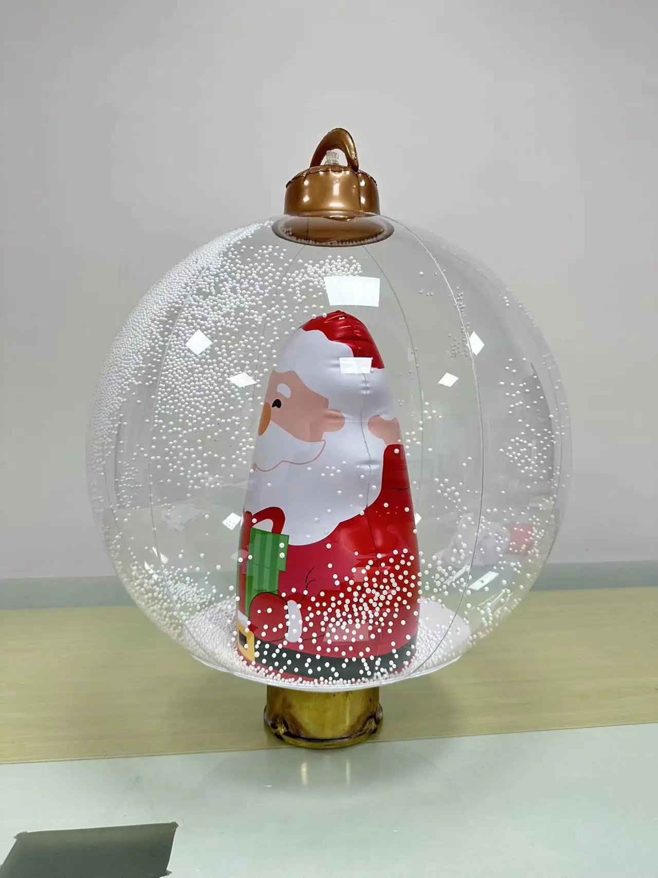 60cm Christmas Inflatable Decora Ball with Santa inside, creating a festive holiday atmosphere