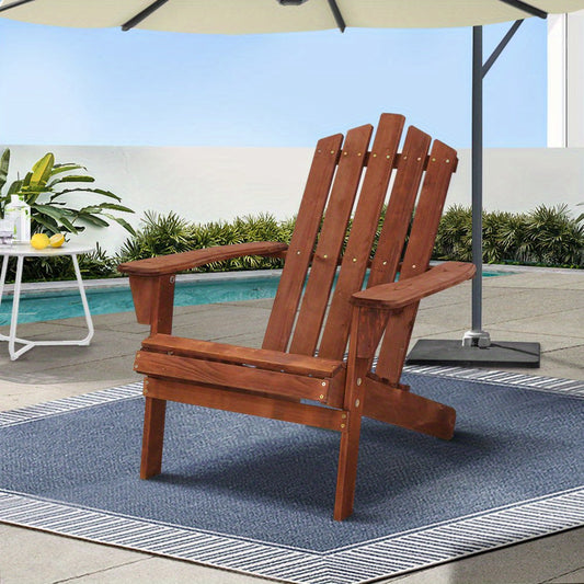 Nutshell wooden Adirondack Chair on outdoor patio rug near pool and umbrella
