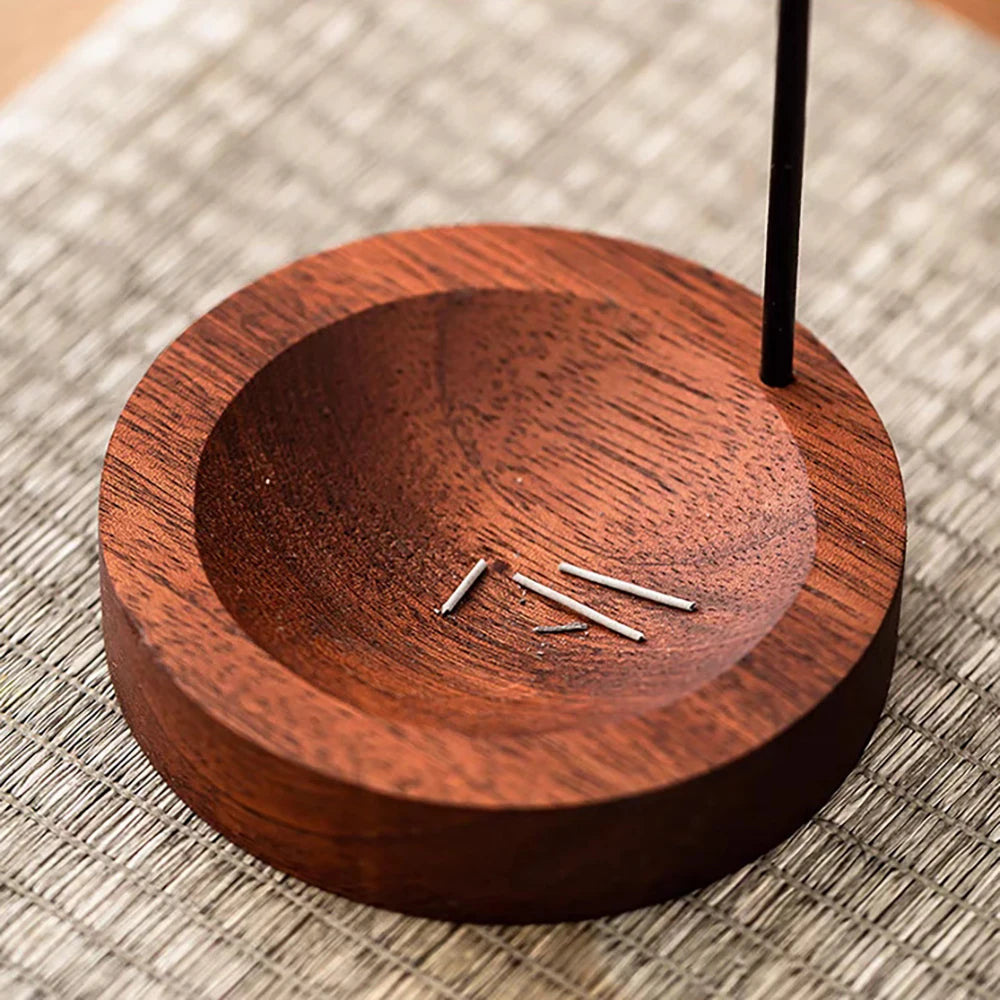 Nutshell wooden anti-ash incense burner with round design holding incense stick and ash