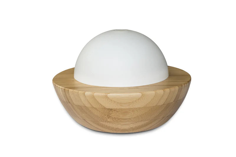 Nutshell bamboo essential oil diffuser with natural wood base and white dome top