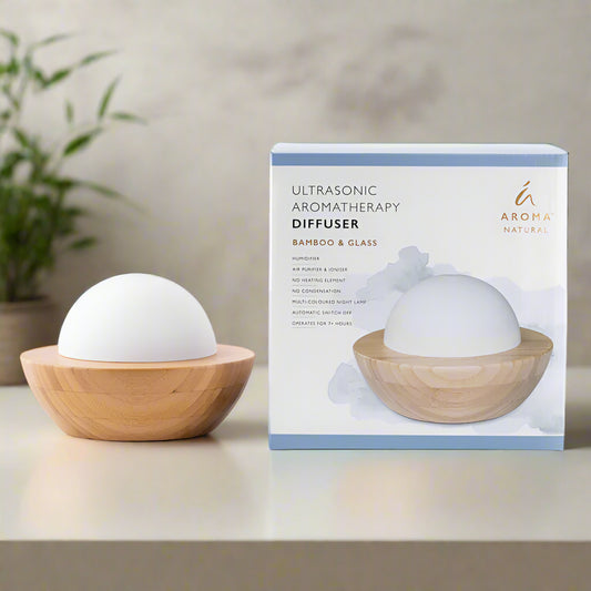 Nutshell bamboo essential oil diffuser with wooden base and white dome for ultrasonic aromatherapy