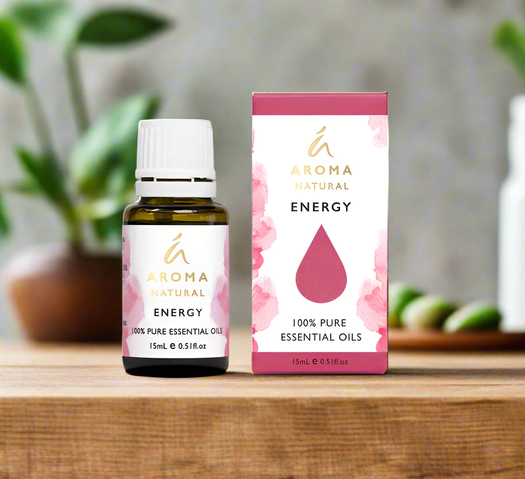 Nutshell Aroma Natural Energy Essential Oil Blend 15ml bottle and box on wooden surface