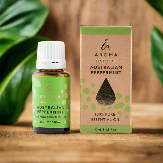 Nutshell Australian peppermint essential oil 15mL bottle with matching green and brown box on wooden surface