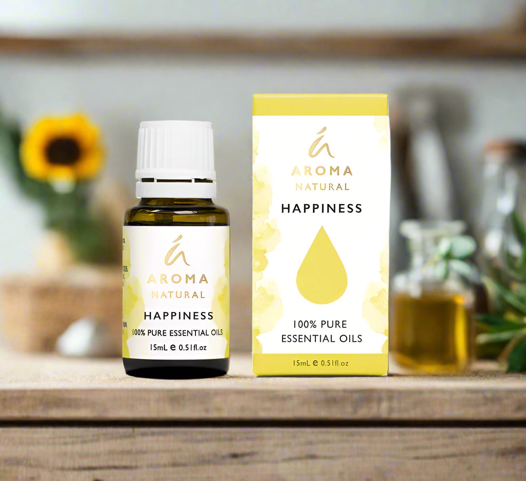 Nutshell Aroma Natural Happiness Essential Oil Blend 15ml bottle with packaging on wooden surface