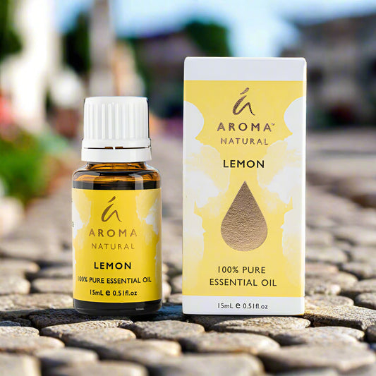 Nutshell Aroma Natural Lemon Pure Essential Oil 15ml bottle with matching box on stone surface