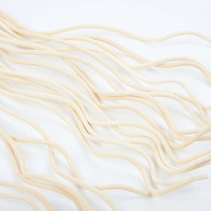 Nutshell aromatherapy wavy reed diffuser sticks in natural wood finish on white background