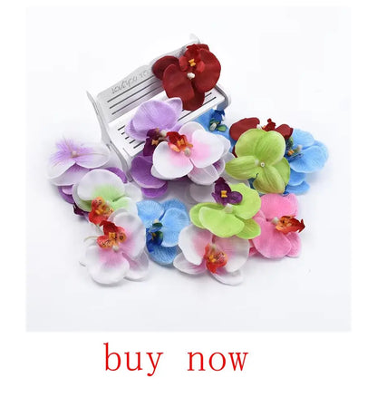 Colorful artificial eucalyptus bouquet featuring vibrant orchids in various colors and sizes
