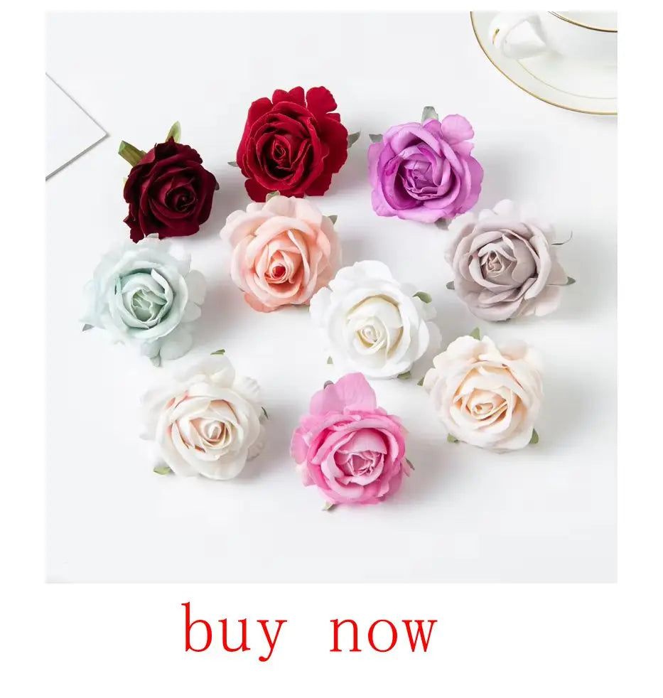 Colorful artificial eucalyptus bouquet featuring various rose designs in shades of pink, white, and red