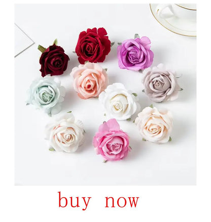 Colorful artificial eucalyptus bouquet featuring various rose designs in shades of pink, white, and red