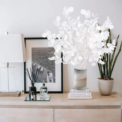 Artificial eucalyptus bouquet in a modern vase, enhancing home decor with a touch of greenery