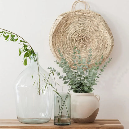 Stylish artificial eucalyptus wall hanging decor with natural woven basket and greenery accents
