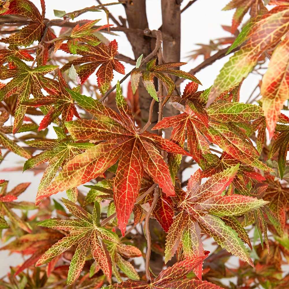 Lifelike artificial Japanese maple tree with vibrant red and green leaves for home decor