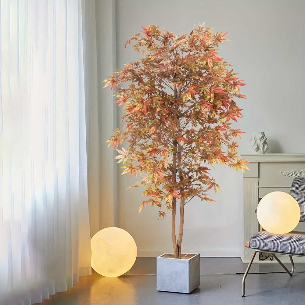Lifelike artificial Japanese maple tree in a decorative planter for home decor
