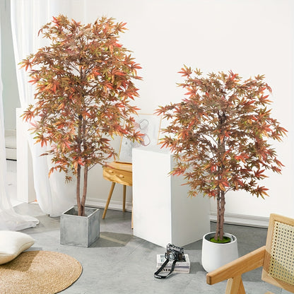 Two artificial Japanese maple trees in stylish pots, enhancing indoor decor with vibrant autumn colors