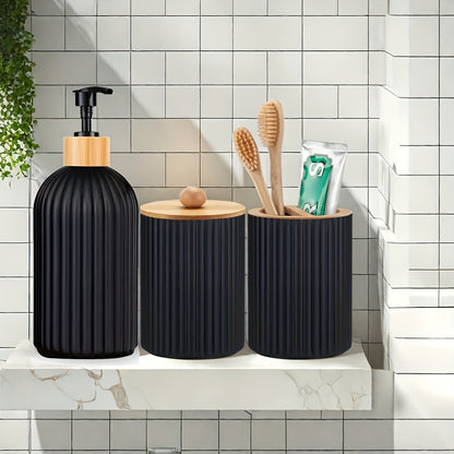 Nutshell Bathroom Dispenser Set with black ribbed design and bamboo accent for a modern look
