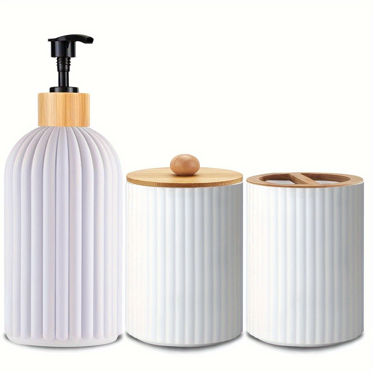 Nutshell Bathroom Dispenser Set featuring a soap pump, storage jar, and toothbrush holder in modern design
