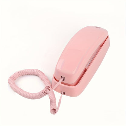 Nutshell Big Button Landline Wall Phone in Pink with coiled cord for easy access and visibility