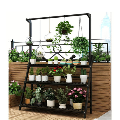 Black 3 Tier Wooden Pot Plant Stand Storage Rack showcasing various potted plants in a garden setting