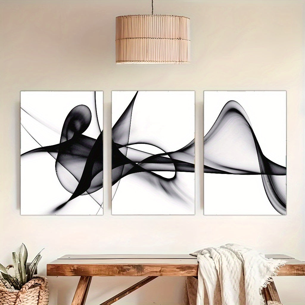Nutshell black and white abstract wall art set featuring three framed pieces with smooth flowing shapes