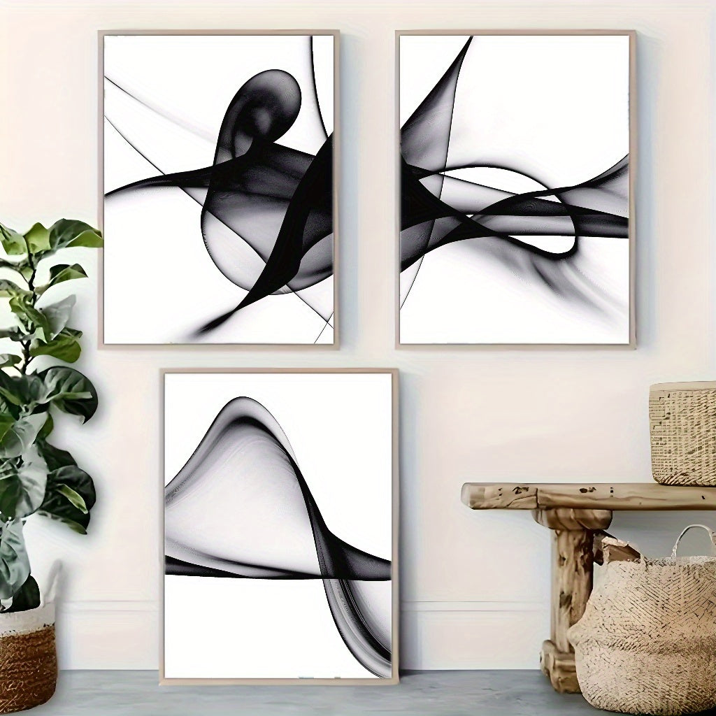 Three framed black and white abstract wall art pieces showcasing fluid lines and shapes