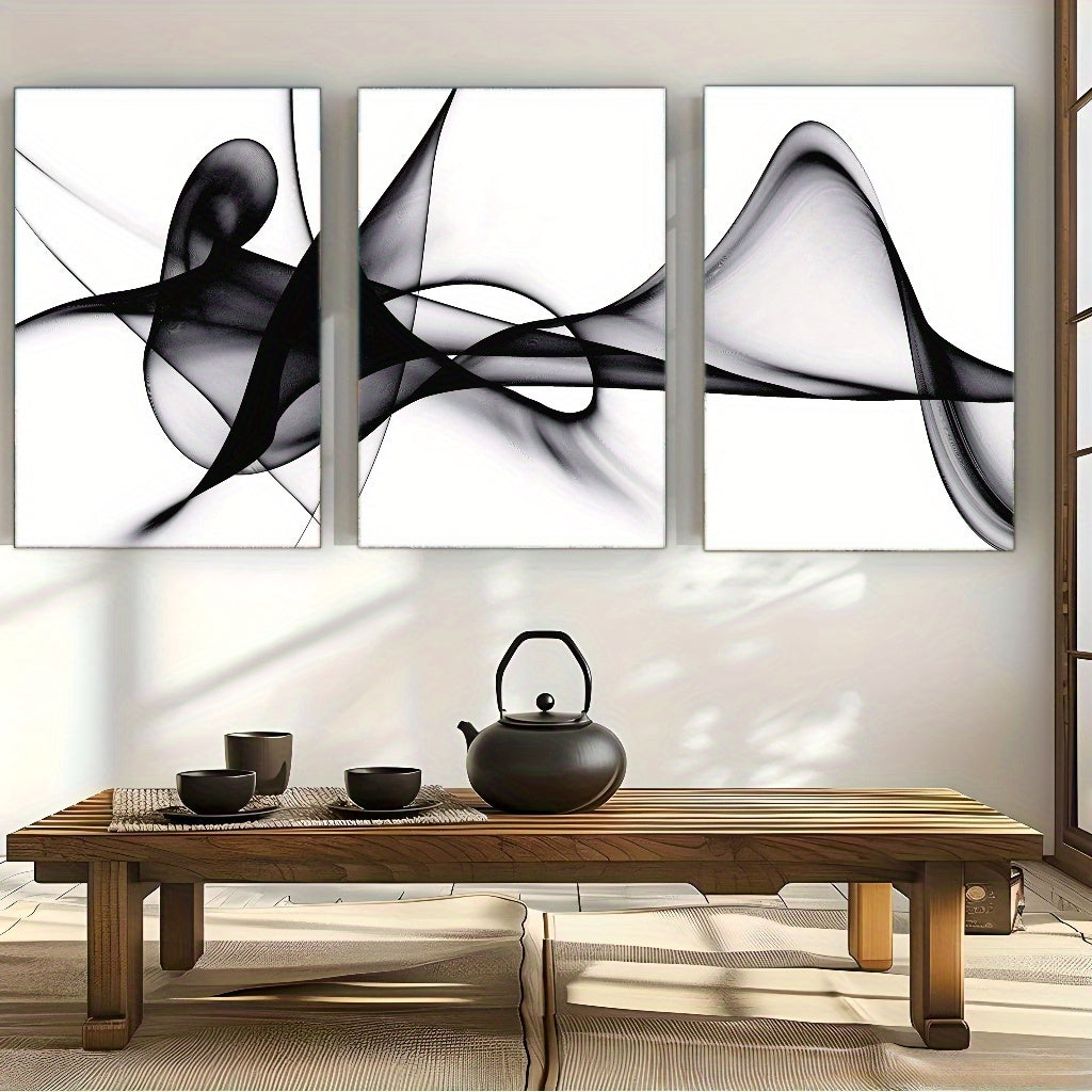 Elegant black and white abstract wall art displayed in a modern living room setting