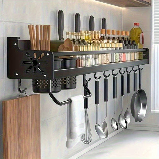 Nutshell black kitchen utensil holder with multiple compartments for organized cooking tools and spices