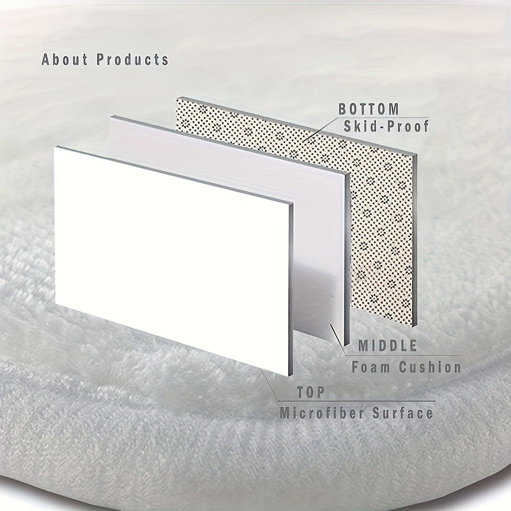 Black laundry floor mat with skid-proof bottom, foam cushion middle, and soft microfiber top surface