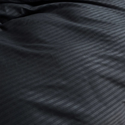 Nutshell black satin duvet cover set with subtle striped pattern and smooth luxurious texture