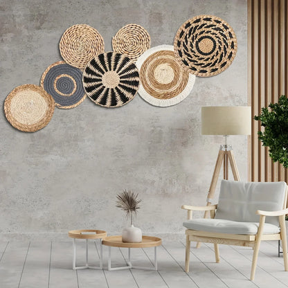 Boho seagrass wall baskets set displayed on a wall in a stylish living room setting