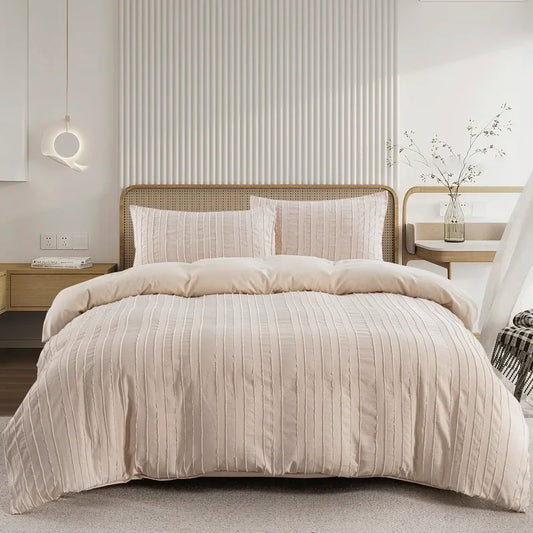 Nutshell boho striped duvet cover set in neutral tones on bed with matching pillow shams