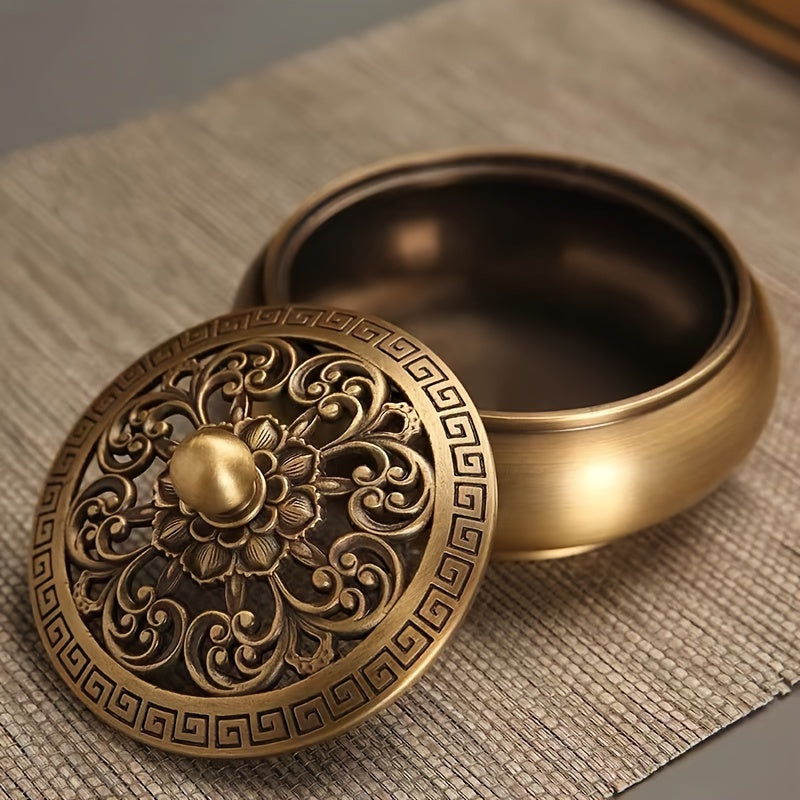 Elegant brass incense burner set with intricate floral design and removable lid for aromatic experiences