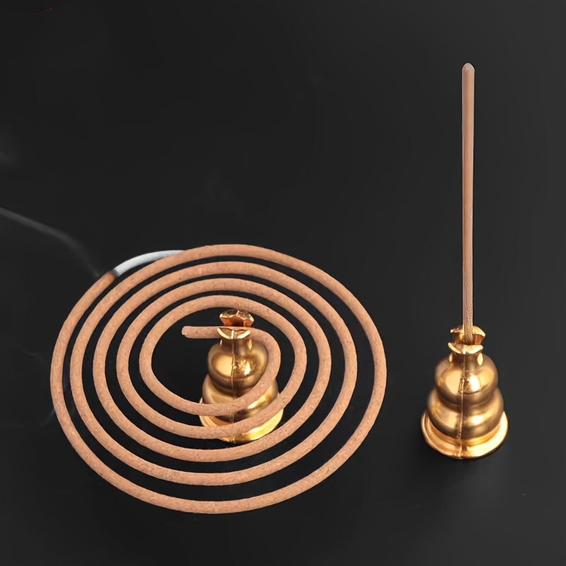 Brass incense burner set featuring a spiral holder and stick for aromatic experiences