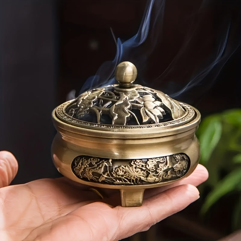 Nutshell brass incense burner set featuring intricate designs with smoke rising from the bowl